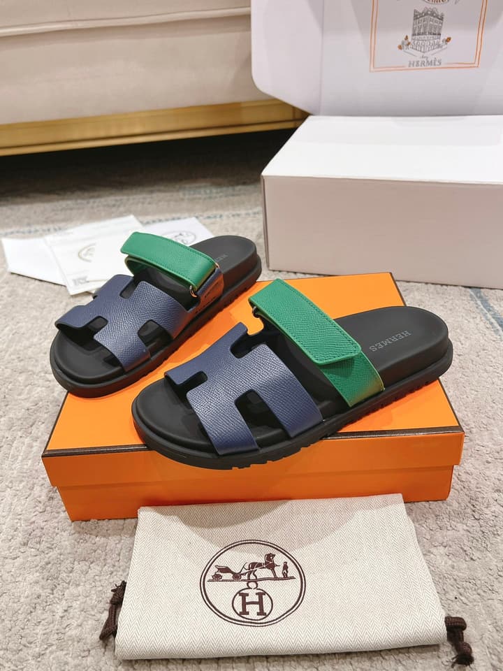 Hermès Chypre Suede Unisex Slides in Black With Dark Blue Strap