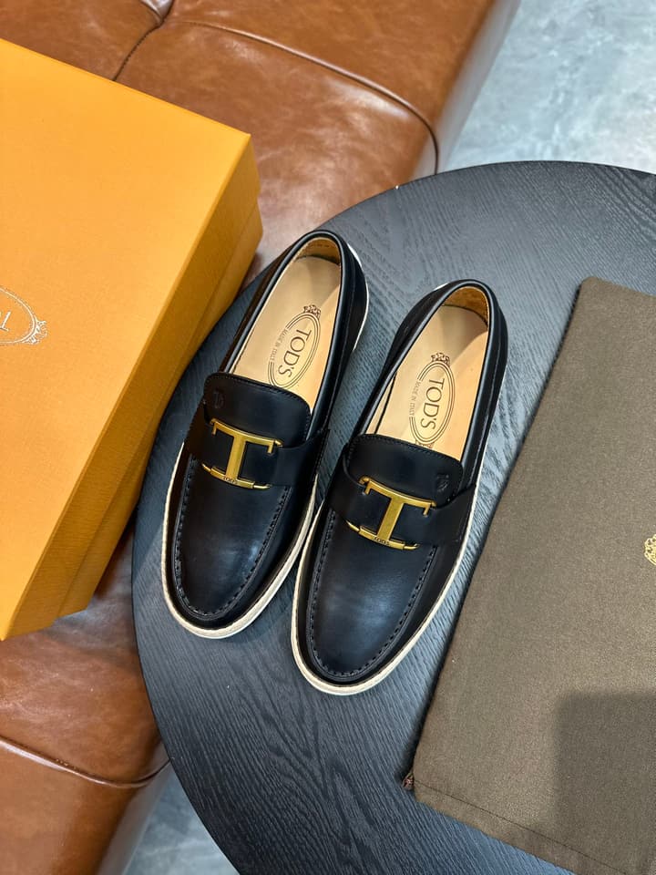 Tod's Gommino Calfskin Loafers in Assorted Loafers Display
