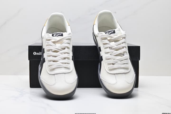 Asics Onitsuka Tiger Tokuten Retro Low-Top Sneakers in Cream Upper With Black Stripes And Black Sole