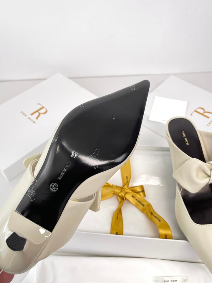 The Row Leather Bow Mules in Black Leather