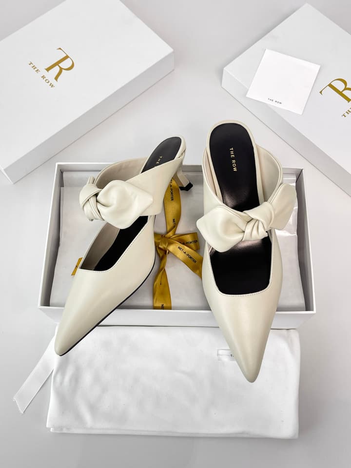 The Row Leather Bow Mules in Black Leather