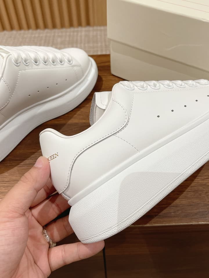 Alexander McQueen Classic Versatile White Sneakers in White With Black Laces & Heel