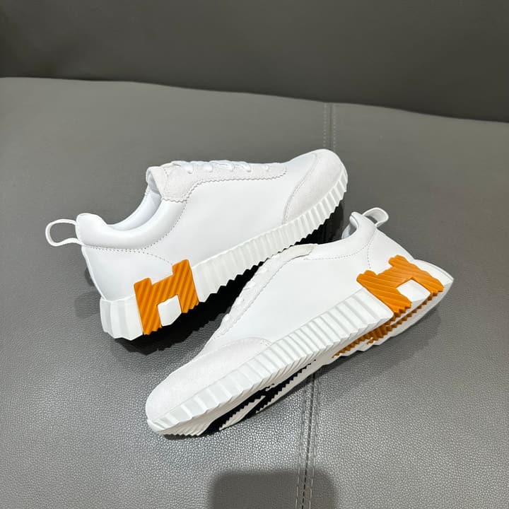 Hermès Bouncing Sneakers in Bright White With Orange H