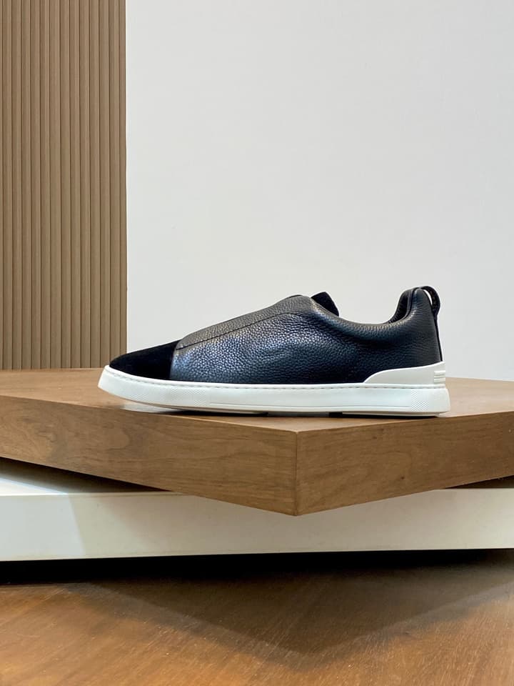 Ermenegildo Zegna Triple Stitch Sneakers in Black Leather With Brown Tag