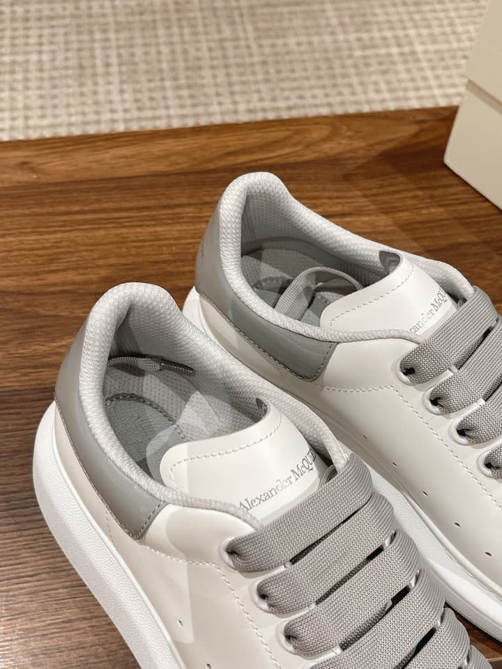Alexander McQueen Classic Versatile White Sneakers in White With Black Laces & Heel