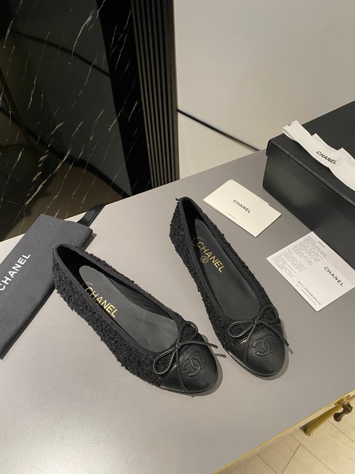 Chanel Classic Ballet Flats in Tan With Black Cap Toe