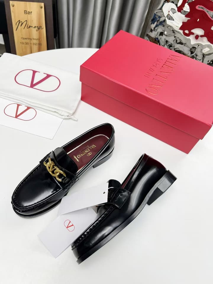 Valentino Logo Buckle Polished Leather Loafers – 2024 Collection in Black