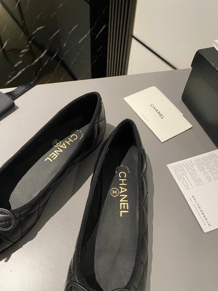 Chanel Classic Ballet Flats in Tan With Black Cap Toe