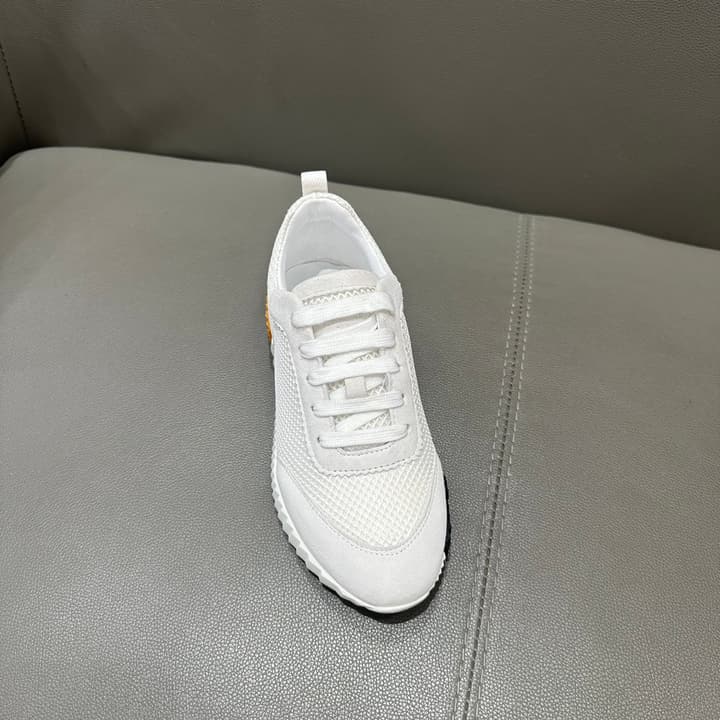 Hermès Bouncing Sneakers in Bright White With Orange H
