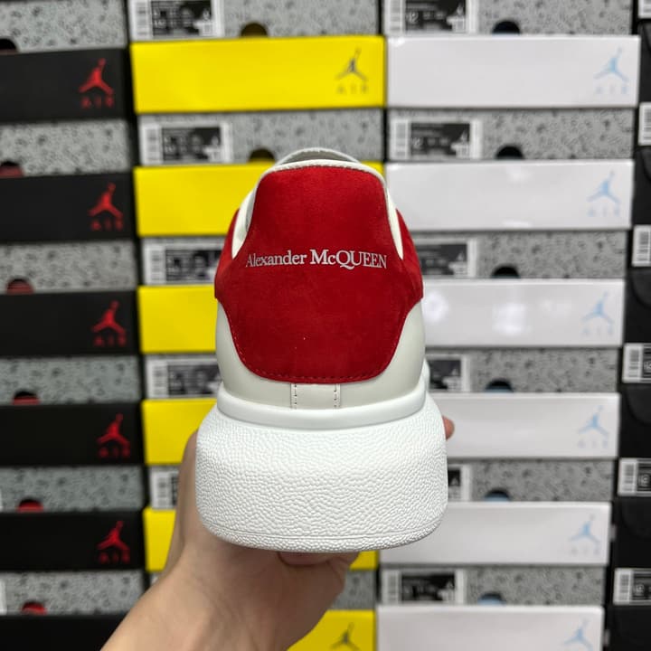 Alexander McQueen Oversized Low-Top Sneakers in All Black With White Sole