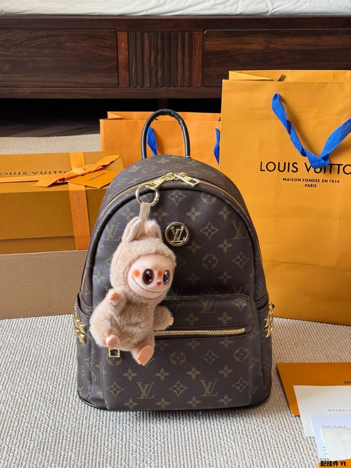 Louis Vuitton Monogram Mini Backpack in Monogram With Light Blue Charm