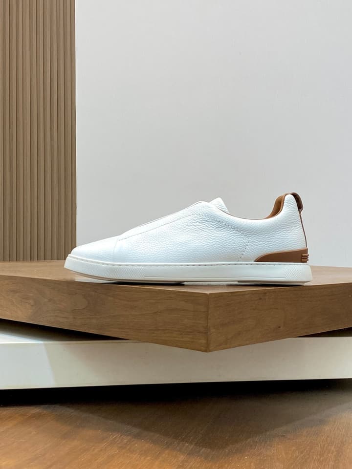 Ermenegildo Zegna Triple Stitch Sneakers in Black Leather With Brown Tag