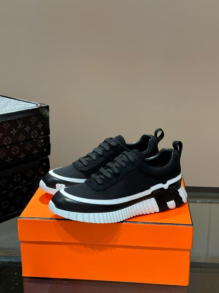 Hermès Bouncing Calfskin Mesh Sneakers in Black With White Stripe