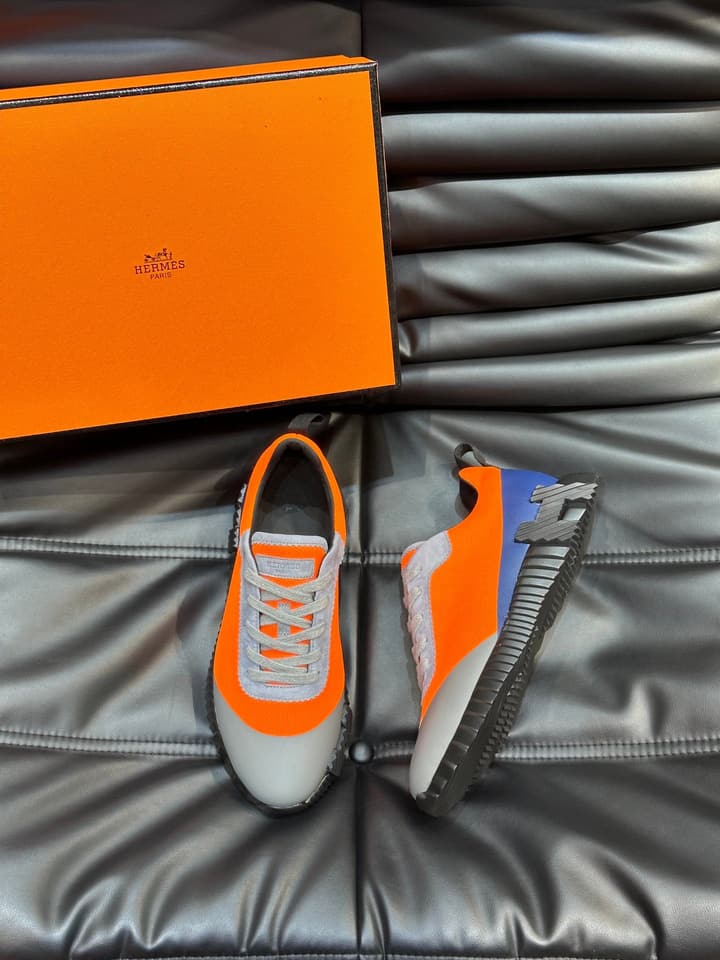 Hermès Bouncing Calfskin Mesh Sneakers in Black With White Stripe
