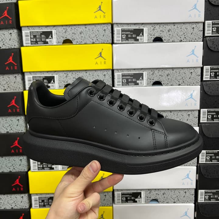 Alexander McQueen Oversized Low-Top Sneakers in All Black With White Sole