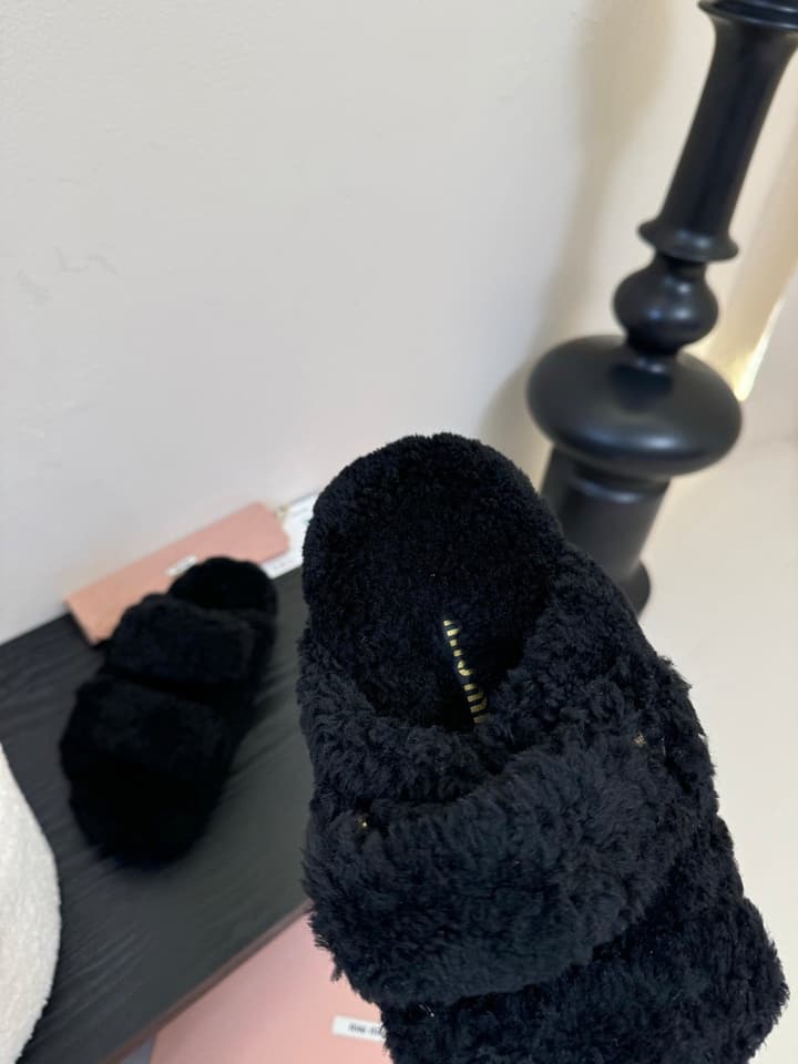 Miu Miu Sheepskin Mules in Black