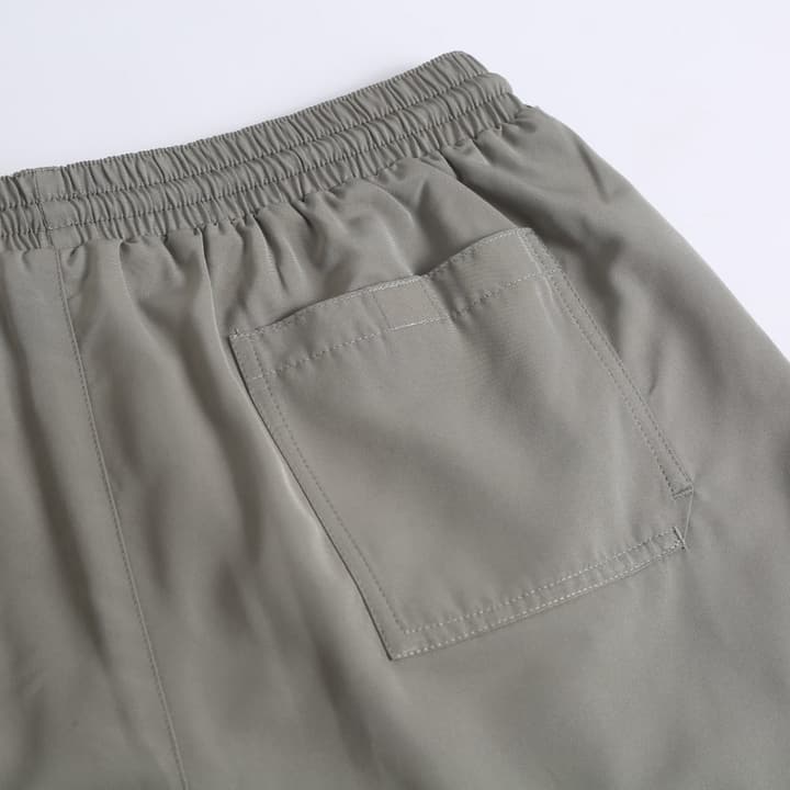 Brunello Cucinelli Embroidered Swim Trunks in Navy Blue