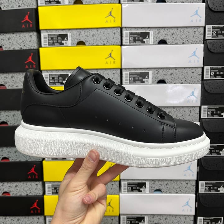 Alexander McQueen Oversized Low-Top Sneakers in All Black With White Sole
