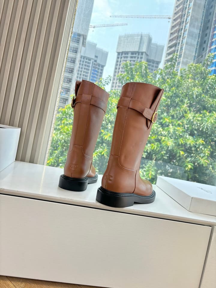Celine Triomphe Knight Ankle Boots – 2025 Fall/Winter Collection in Black And Brown Leather Display