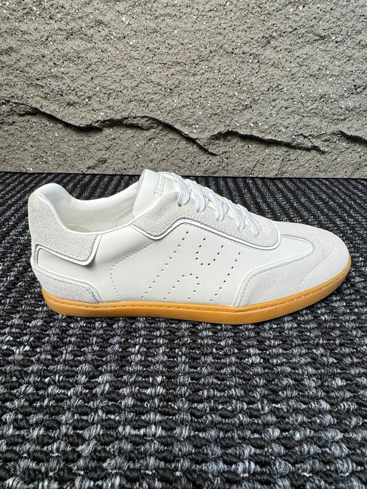 Hermès Laser-Punched H Nappa Calfskin Sneakers in Black