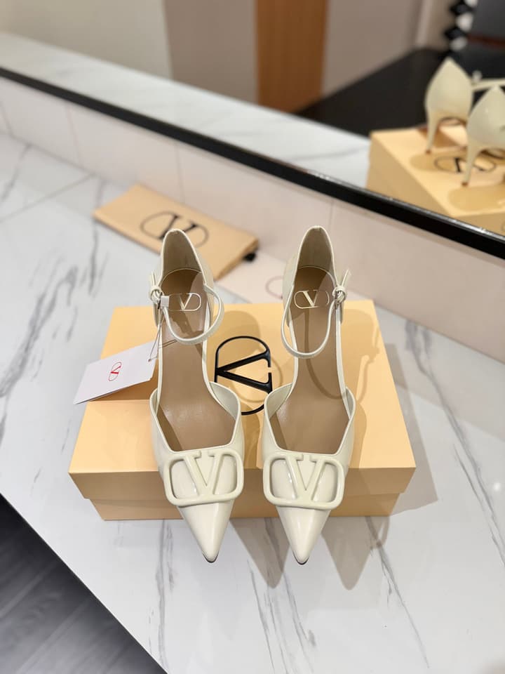Valentino Garavani VLogo Signature Slingback Sandals in Black