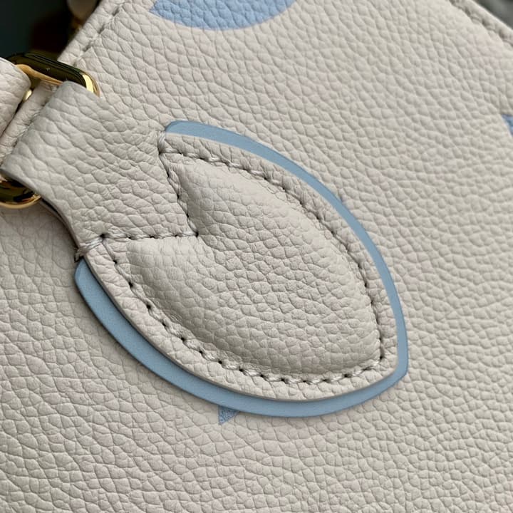 Louis Vuitton ONTHEGO Small Monogram Tote Bag in Cream With Blue Monogram
