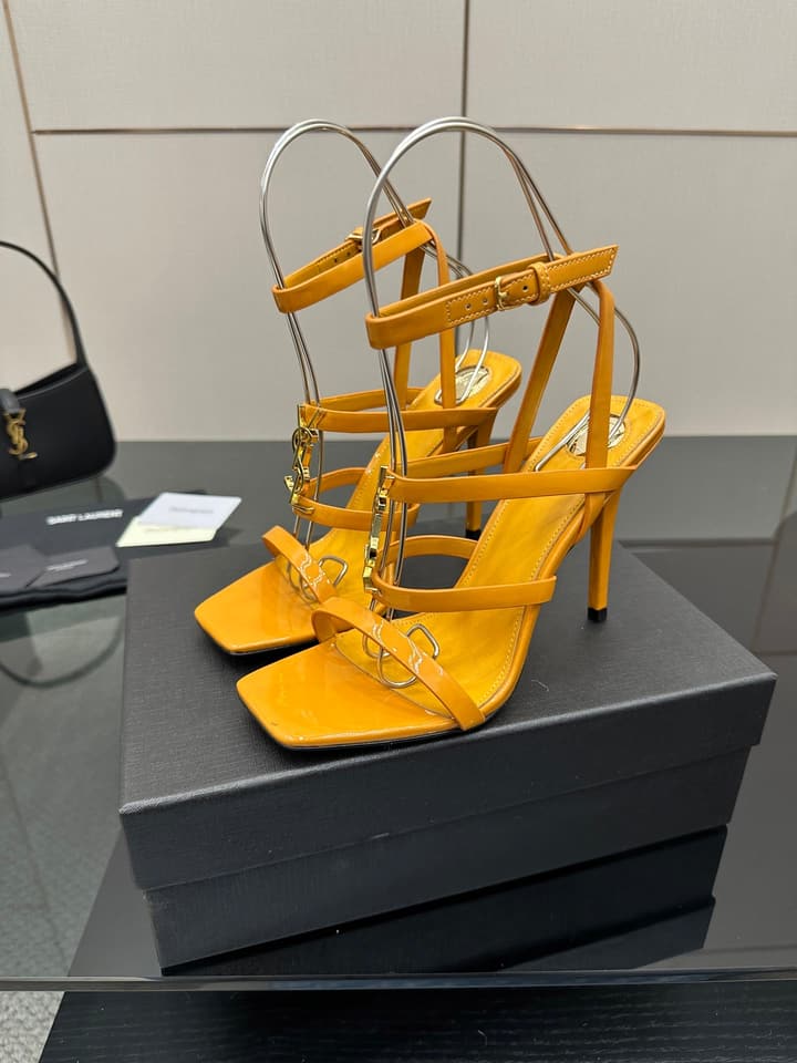 Saint Laurent Patent Leather Heeled Sandals in Bright Amber