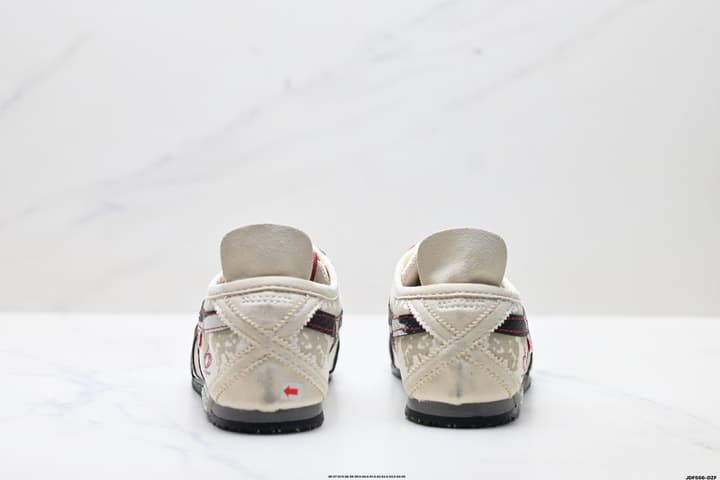 Onitsuka Tiger Mexico 66 Slip-On Casual Sneakers in Cream Black Stripes Graphic