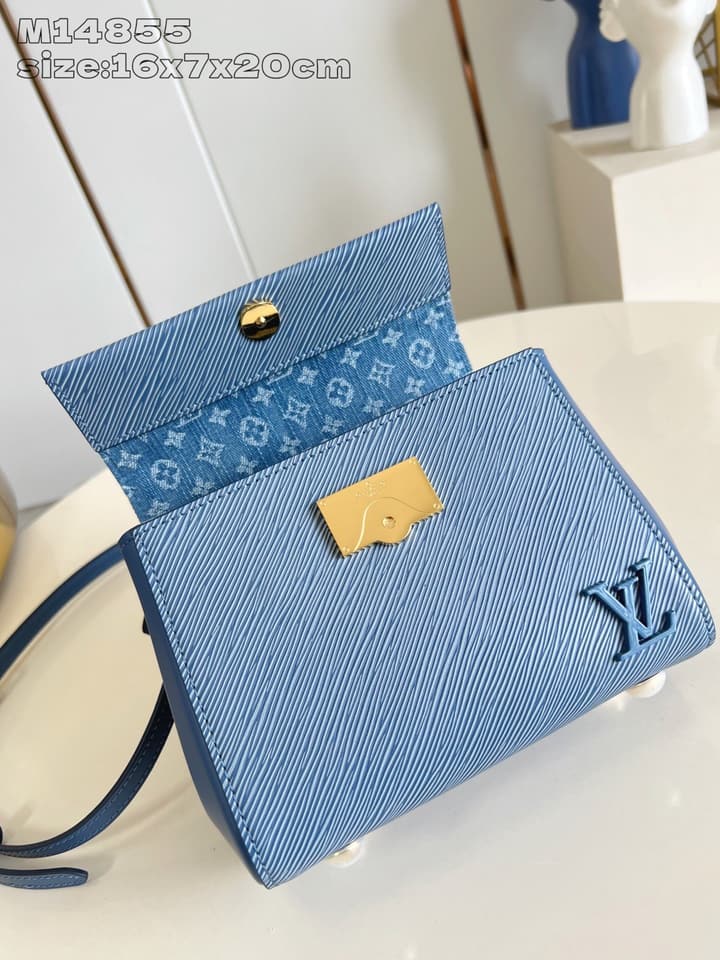 Louis Vuitton Cluny Mini Handbag in Beige