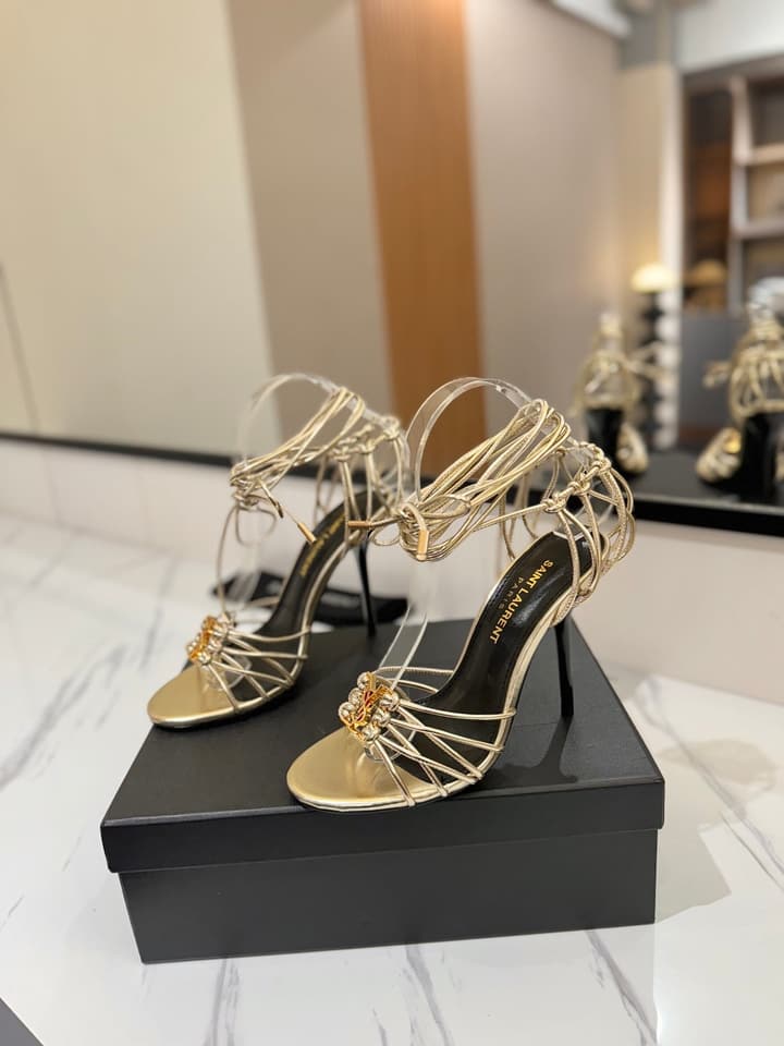 Saint Laurent Letter Buckle Pumps in Bright Gold