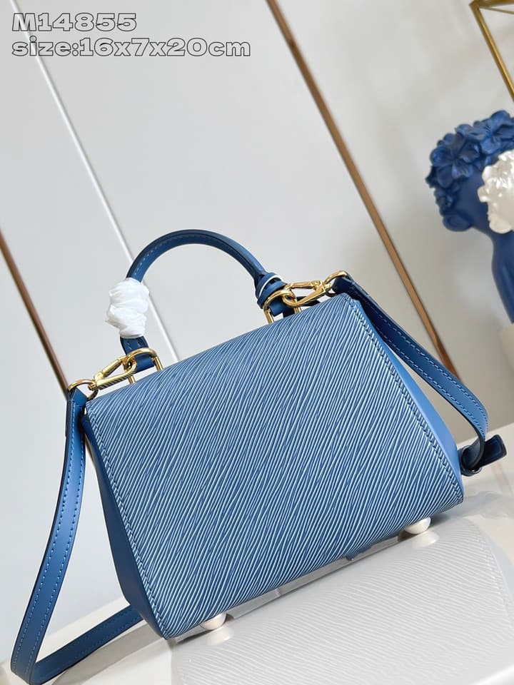 Louis Vuitton Cluny Mini Handbag in Beige