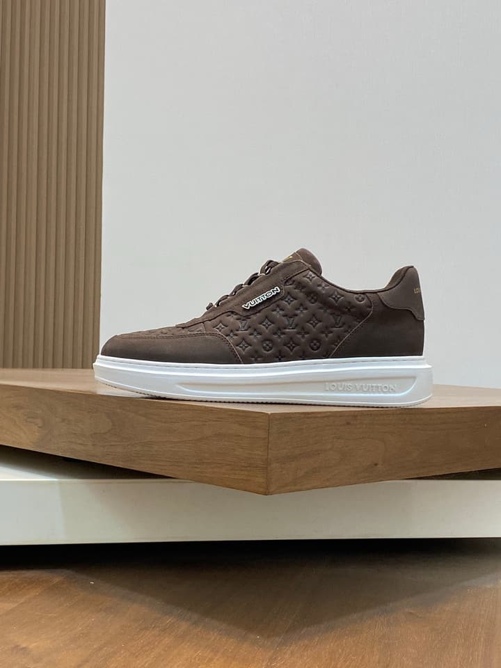 Louis Vuitton Embossed Calfskin Sneakers in Black