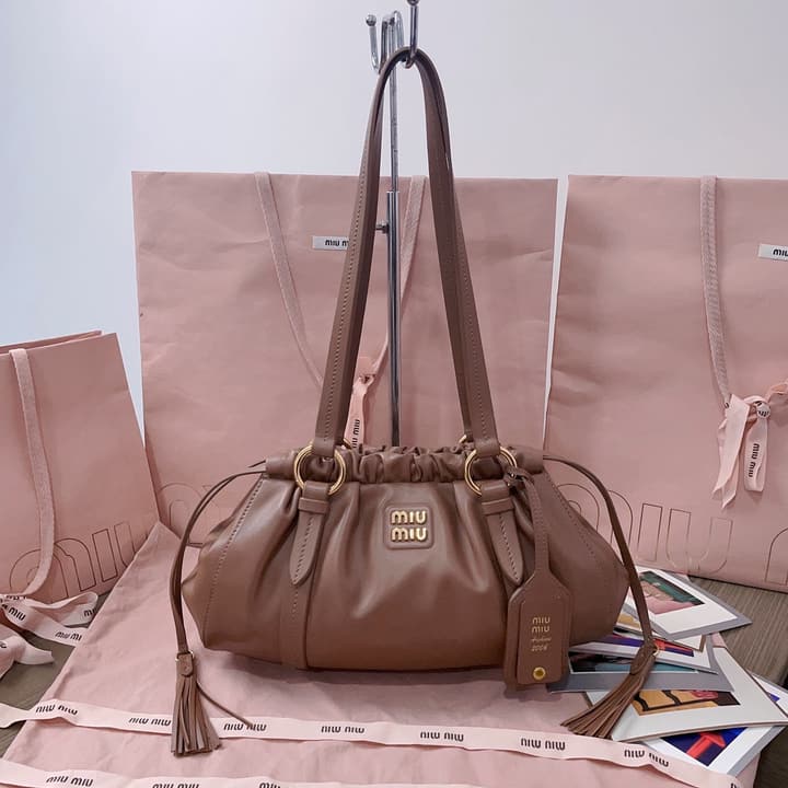 Miu Miu Tassel Drawstring Bucket Bag – New Collection in Black
