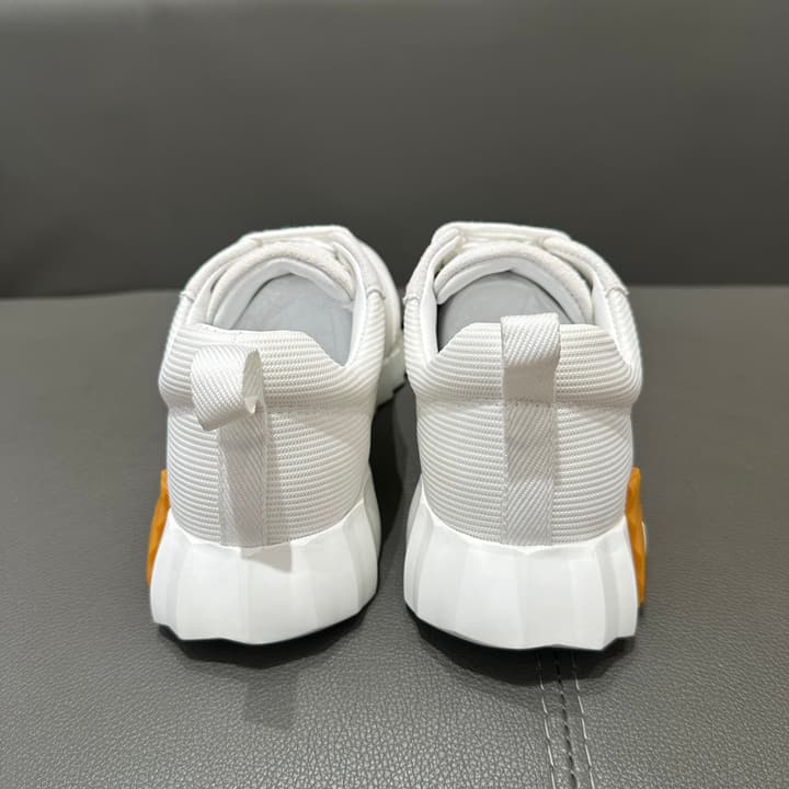 Hermès Bouncing Tech Mesh Sneakers in Black And White