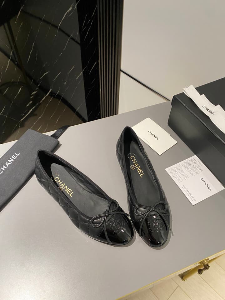 Chanel Classic Ballet Flats in Tan With Black Cap Toe