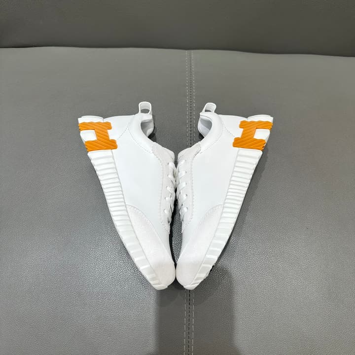 Hermès Bouncing Sneakers in Bright White With Orange H