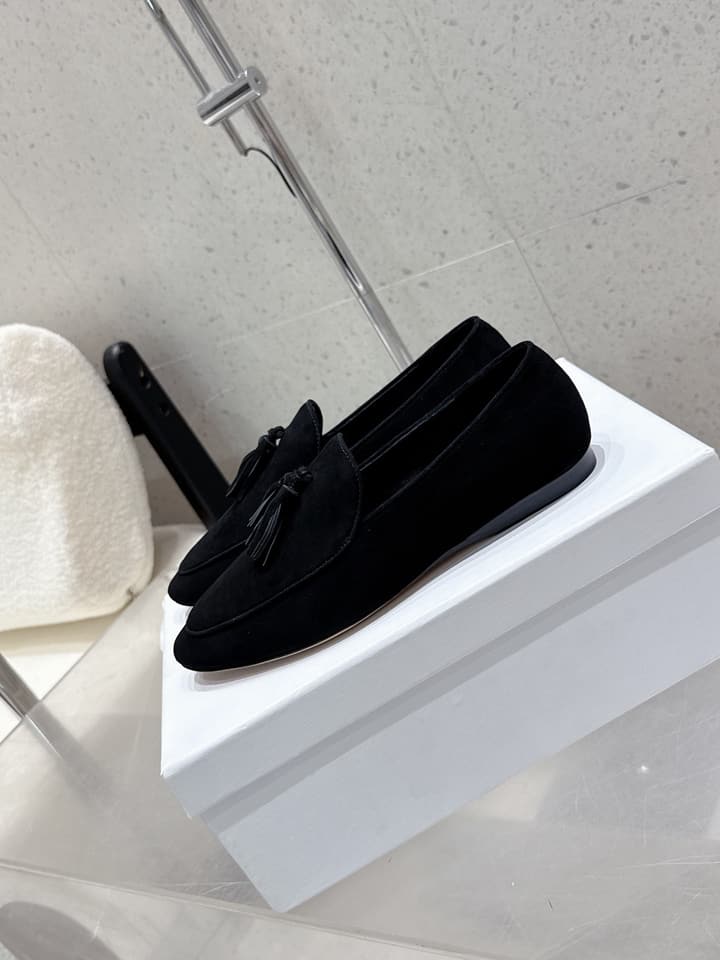 The Row Tassel Loafers in Black Suede