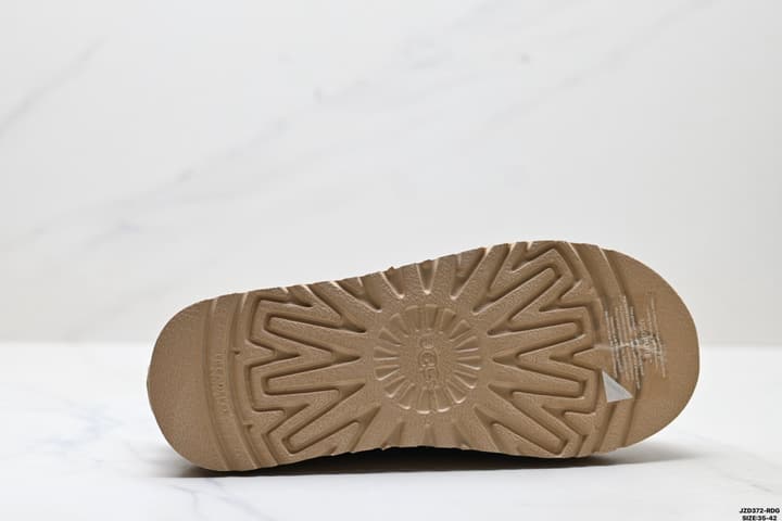 UGG Tazz Slip-On Snow Boots in Sand Braid