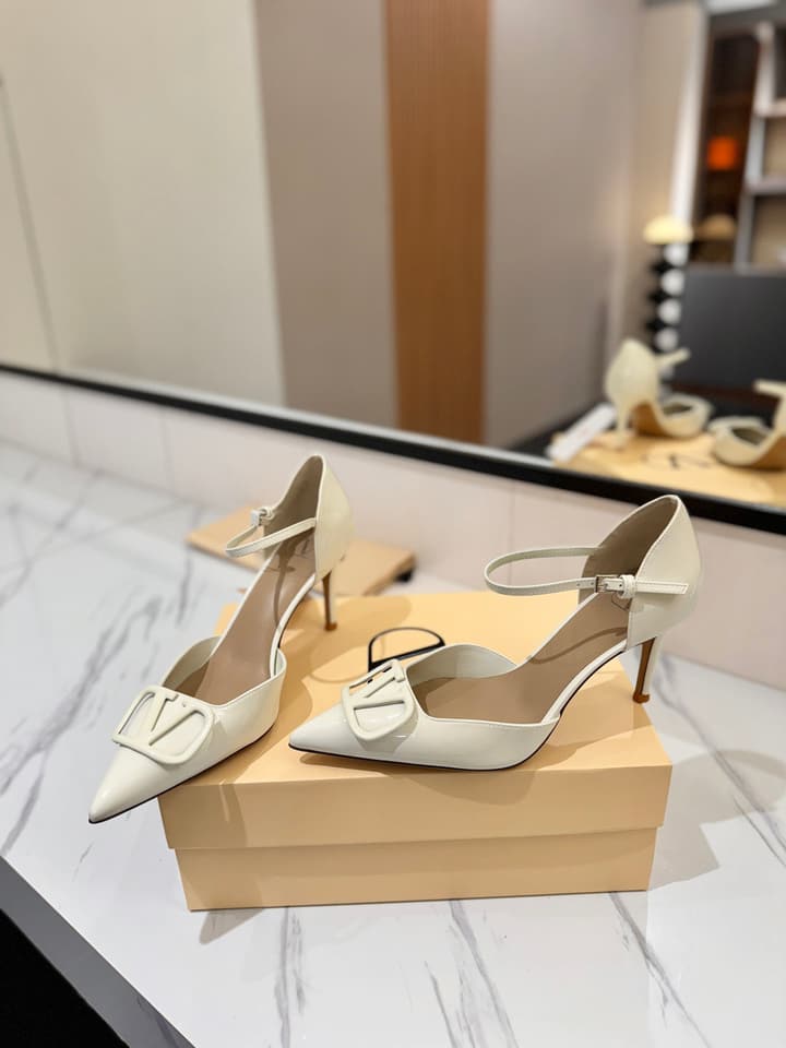Valentino Garavani VLogo Signature Slingback Sandals in Black