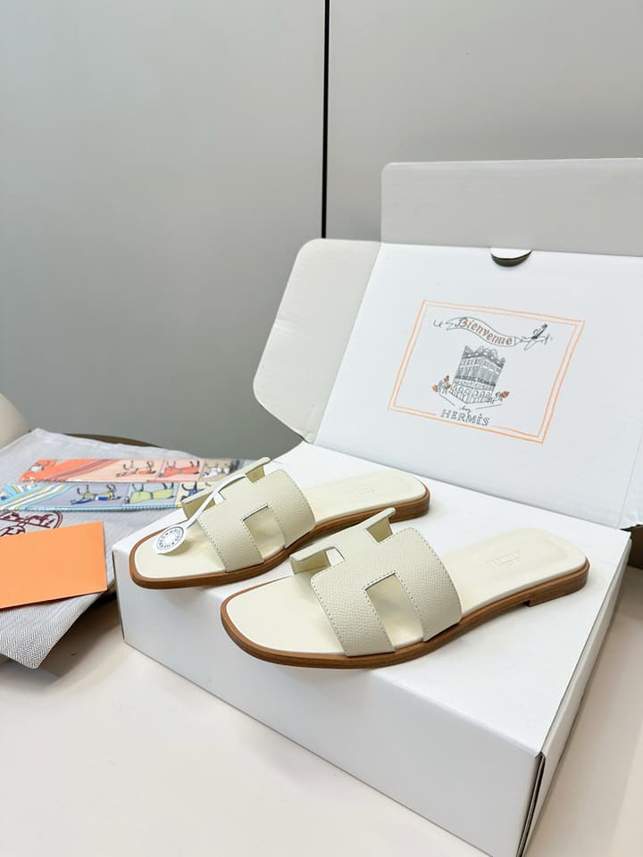 Hermès Palm Grain H-Slides in Bright Green
