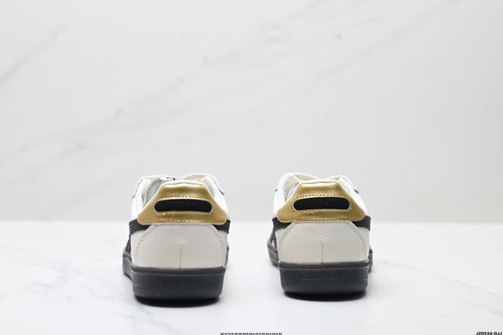 Asics Onitsuka Tiger Tokuten Retro Low-Top Sneakers in Cream Upper With Black Stripes And Black Sole