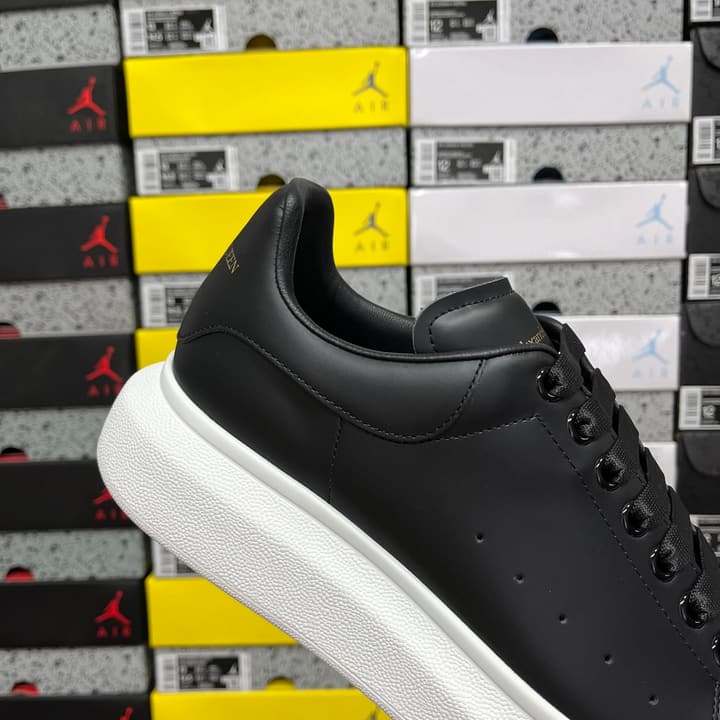 Alexander McQueen Oversized Low-Top Sneakers in All Black With White Sole