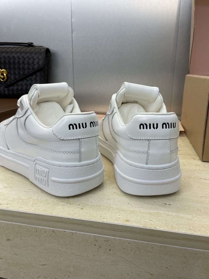 Miu Miu 2025FW Runway Lace-Up Casual Sneakers – 2025FW in Distressed Off-white Sneaker