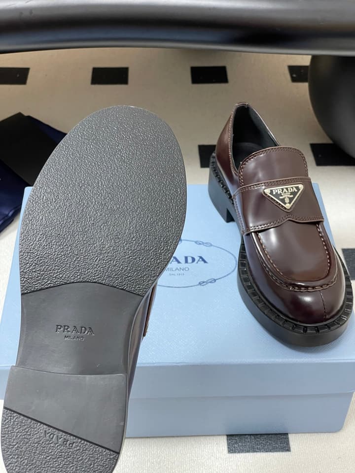 Prada Triangle Logo Platform Loafers in Black