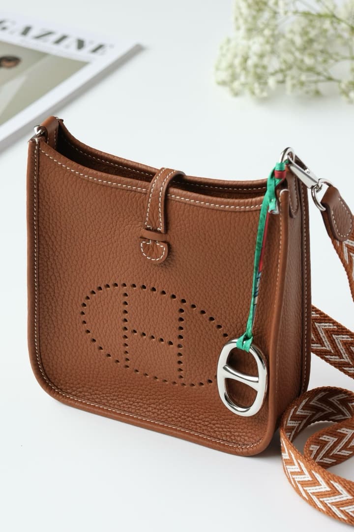 Hermès Mini Evelyne TPM – Gold Brown in Gold Brown With Patterned Strap