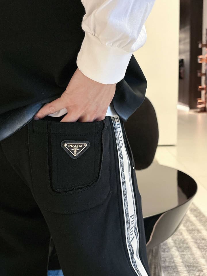 Prada Classic Logo Casual Pants – 2025FW in Black With White Side Stripe