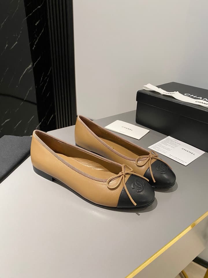 Chanel Classic Ballet Flats in Tan With Black Cap Toe