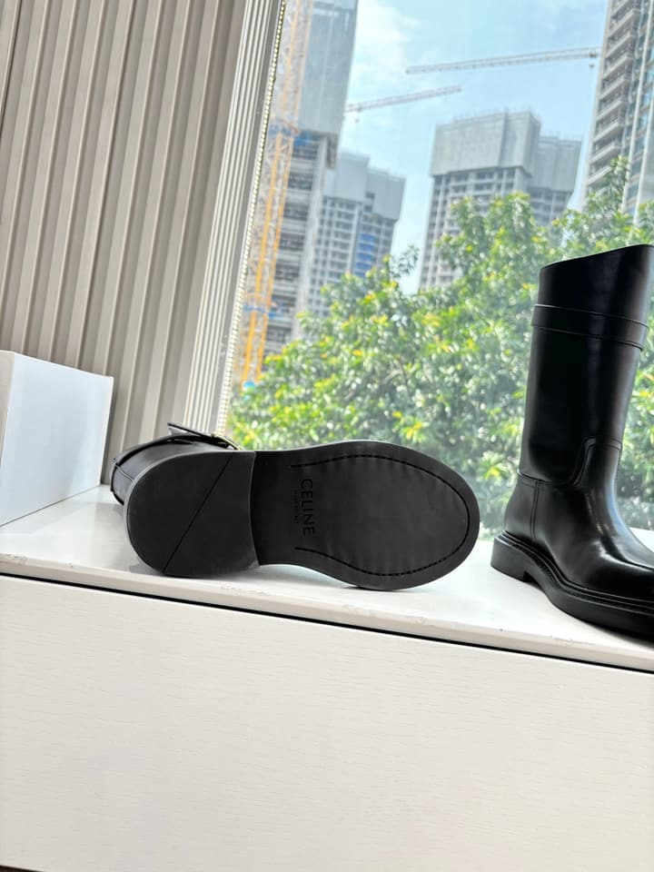 Celine Triomphe Knight Ankle Boots – 2025 Fall/Winter Collection in Black And Brown Leather Display