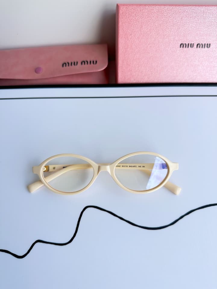 Miu Miu SMU04Z Black Frame Transparent Lens Sunglasses – 2023 Autumn/Winter Collection in Beige