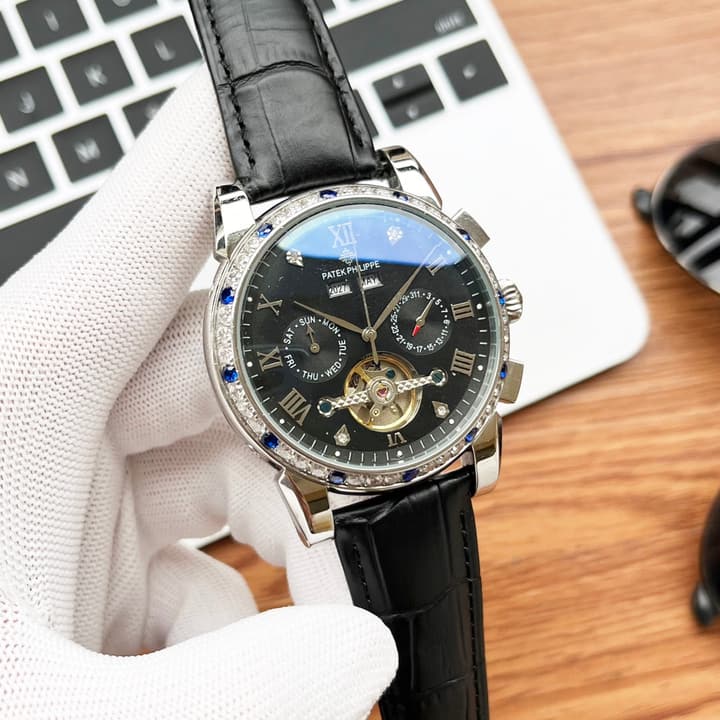 Patek Philippe Men's Automatic Watch in Gold
